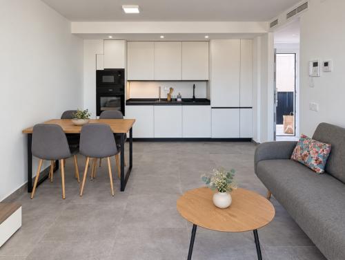 Salón y cocina abierta · M208